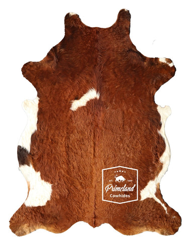 Brown and White Cowhide Rug