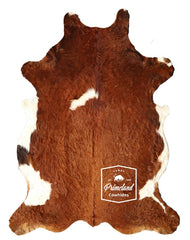 Brown and White Cowhide Rug