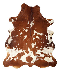 Brown and White Cowhide Rug