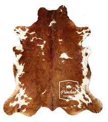 Brown and White Cowhide Rug