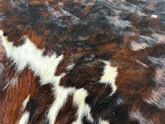 Dark Brindle Tricolor Cowhide Rug