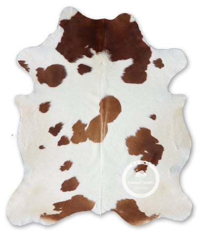 Brown and White Cowhide Rug