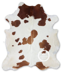 Brown and White Cowhide Rug