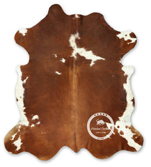 Brown and White Cowhide Rug